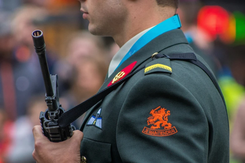 a man holding up a gun during a game