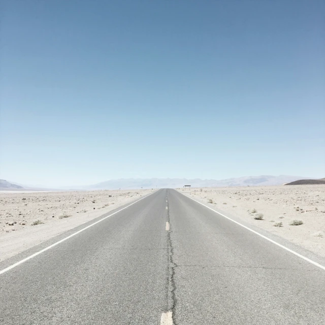 the road that stretches into the sky and is empty