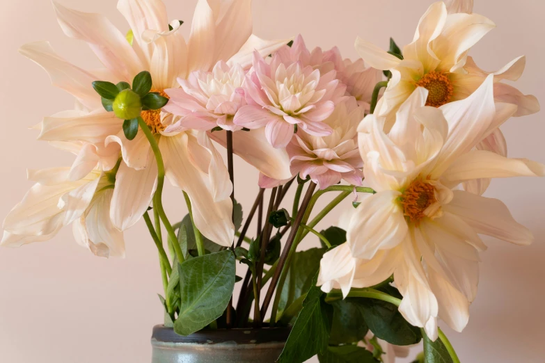 a vase with some very pretty flowers in it