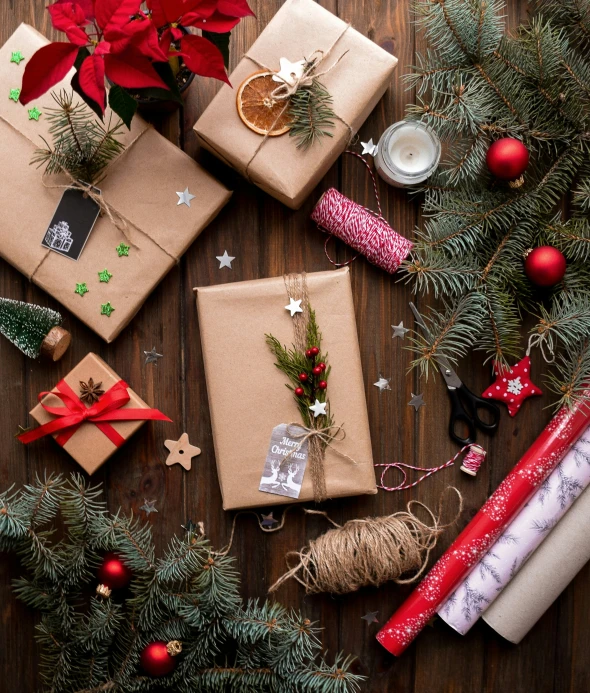 a collection of presents sitting on a wooden table