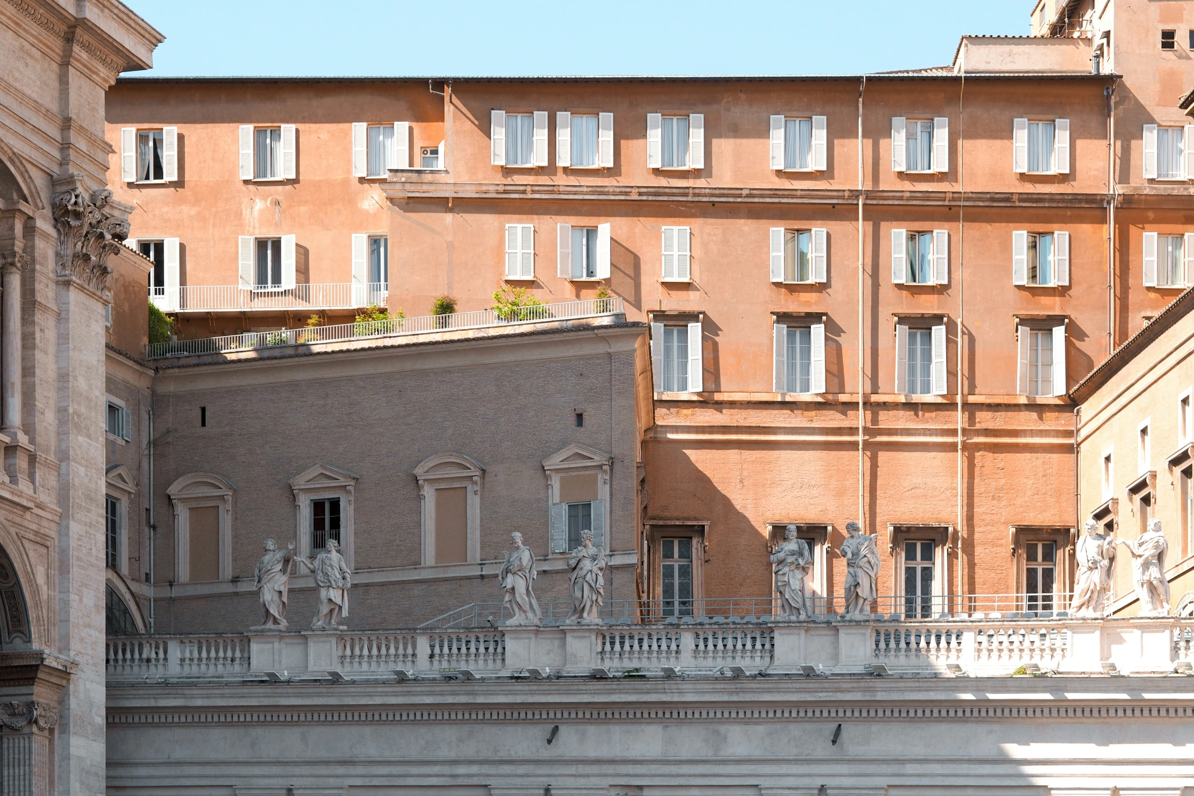 a building with some statues on top of it