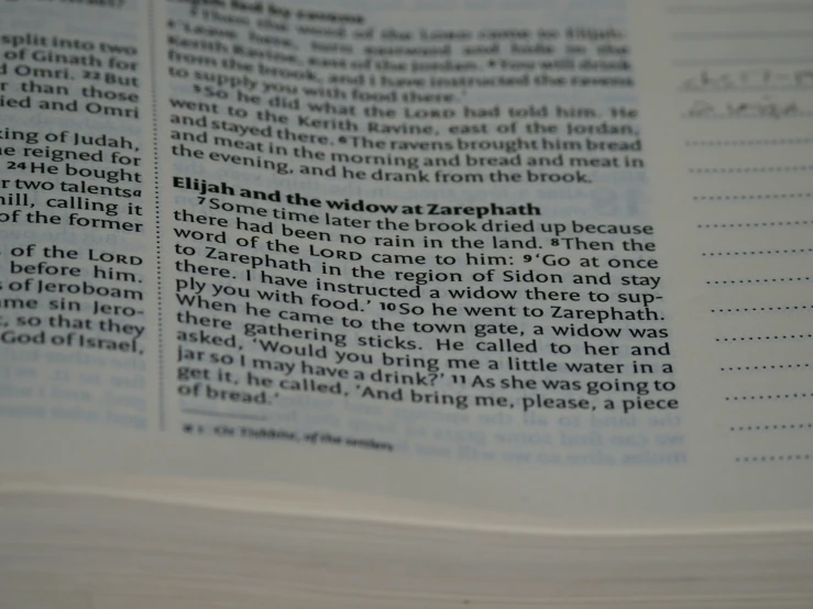 a close up view of a religious text on a book