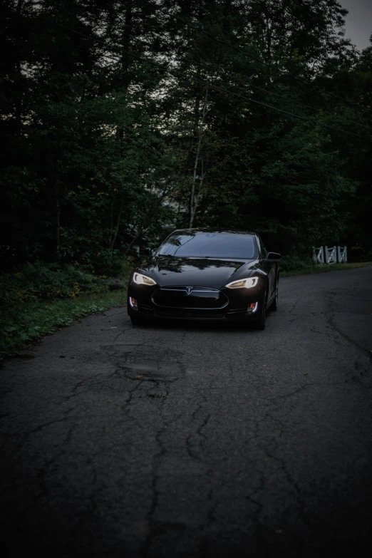 a car that is parked on the road in front of a lot