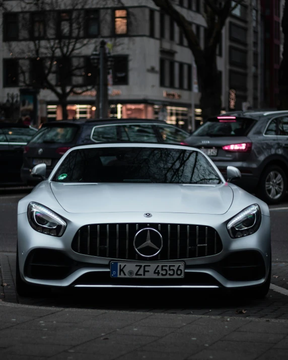 a mercedes sls in the middle of the city