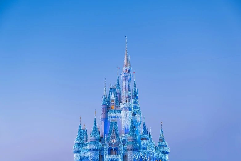 a large blue castle that is under a sky