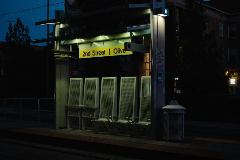 a store front lit up at night time