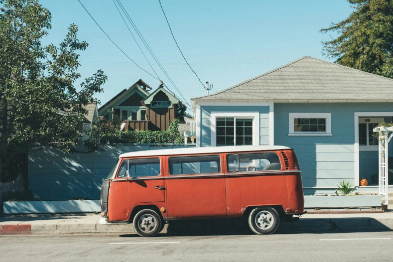 a small car parked on the side of a street