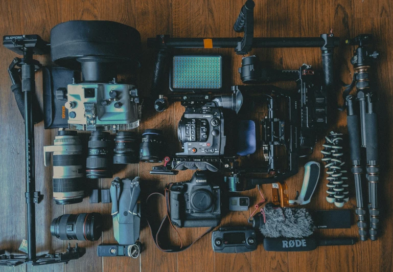 a group of camera equipment sitting on top of a table