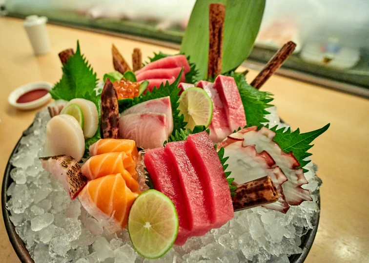 a sushi dish in a glass dish on ice