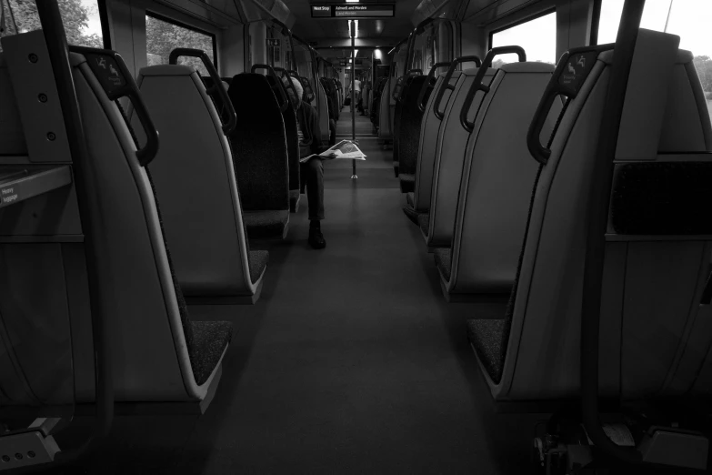 view inside an empty bus car in black and white