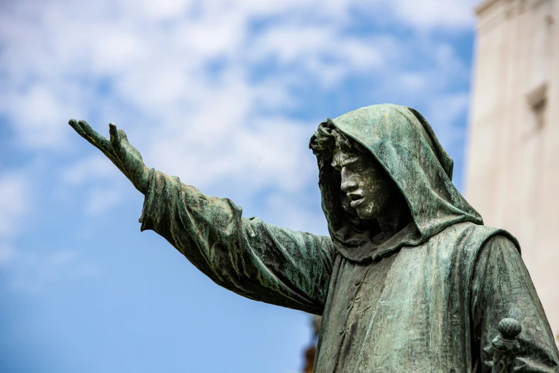 the statue of a man wearing a green jacket