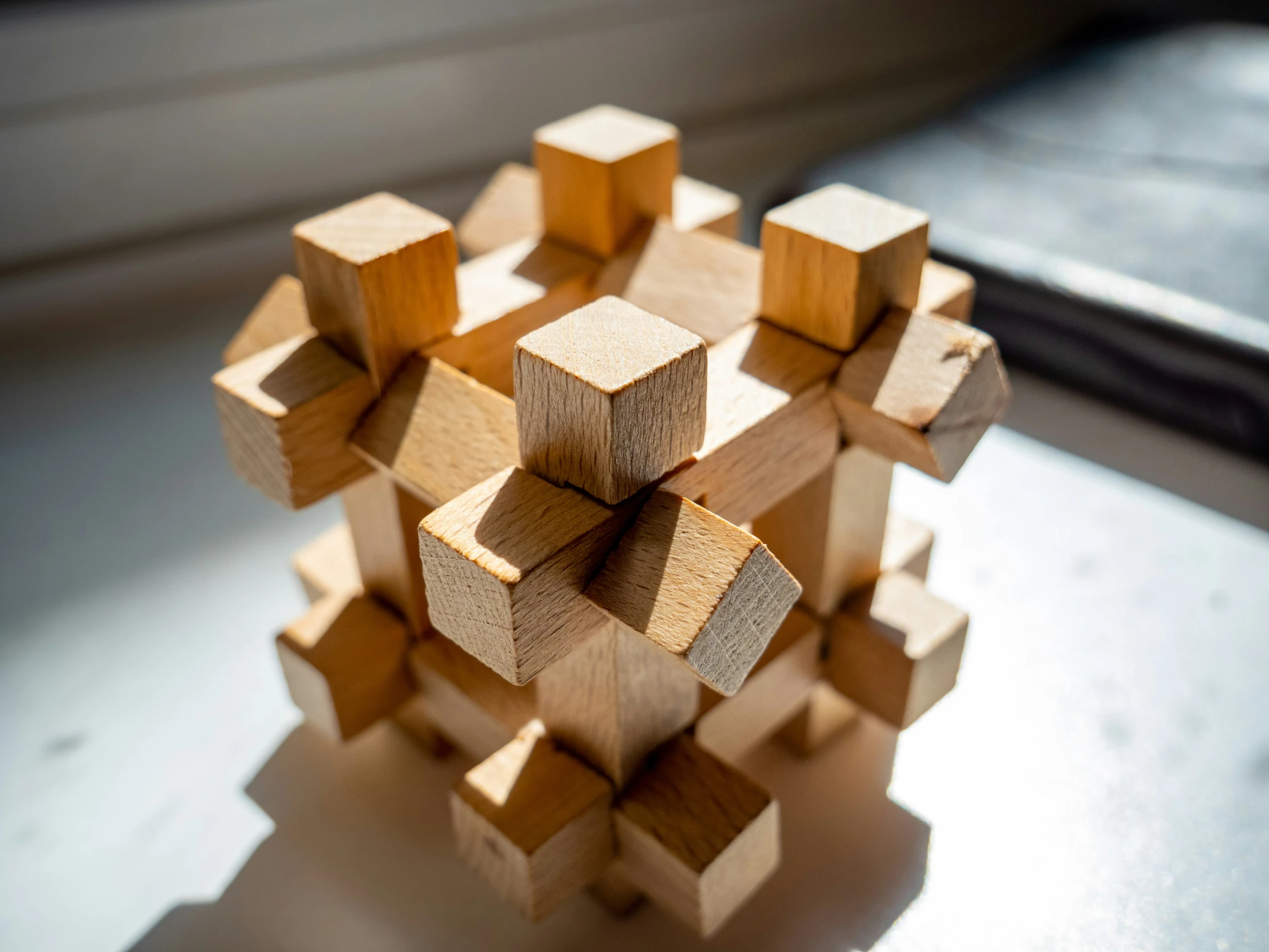 a circular object made out of wooden cubes