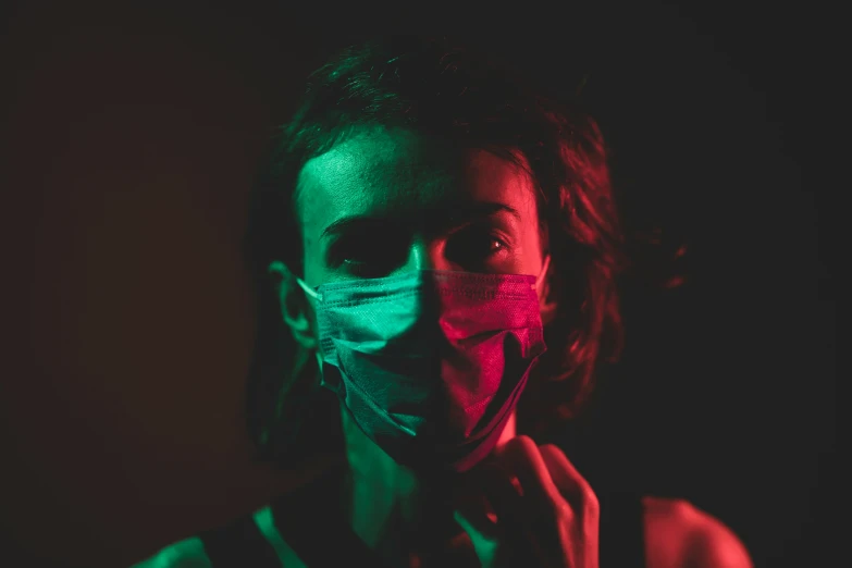 a girl with face mask, dark background