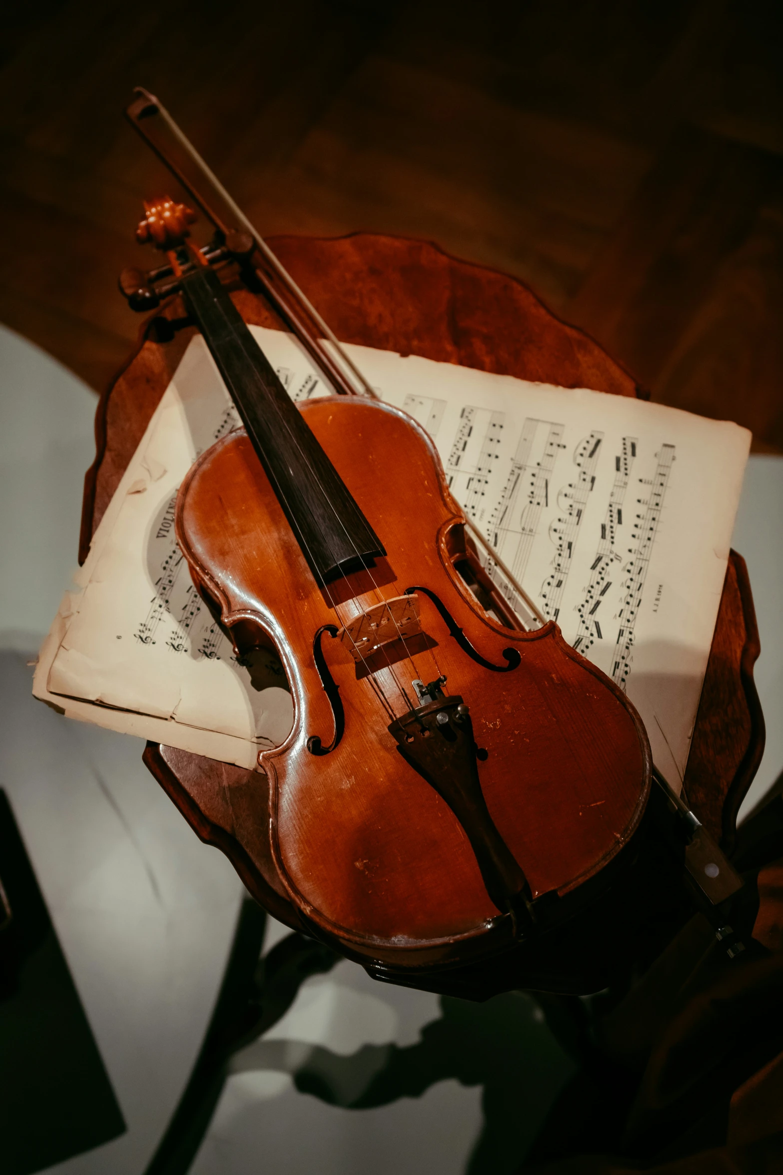 an instrument sits on top of some sheet music