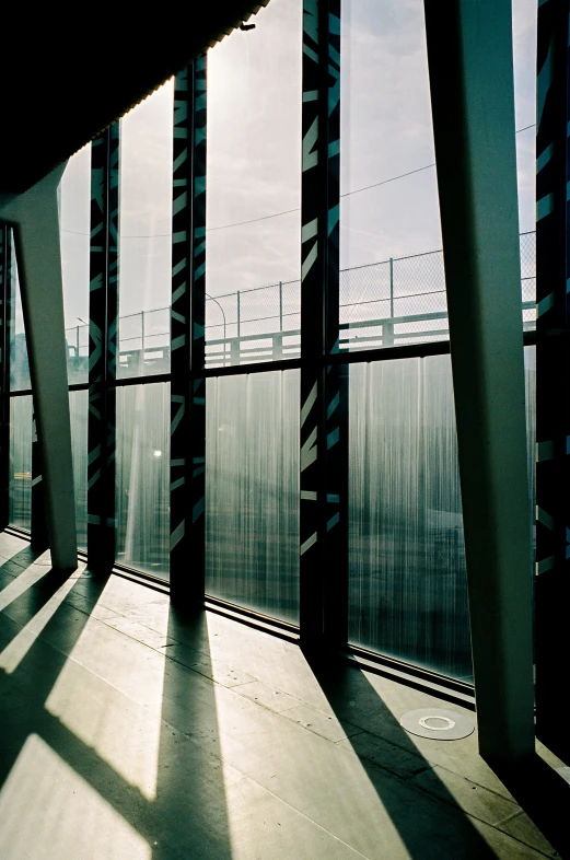 a building with windows with light shining through them