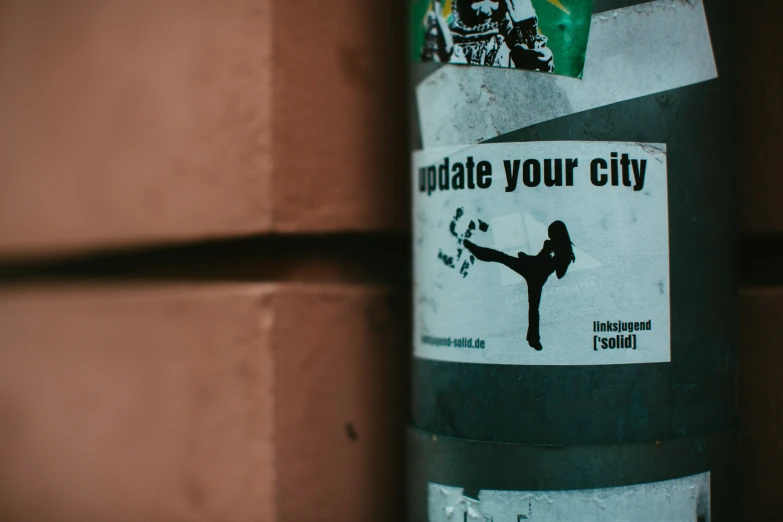 the sticker shows a man doing a karate kick