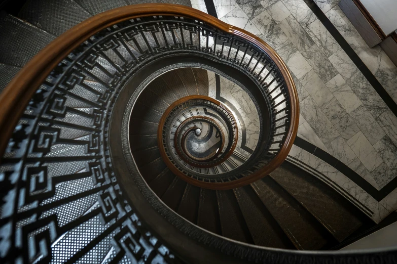 this is an image of spiral staircase with artistic railings