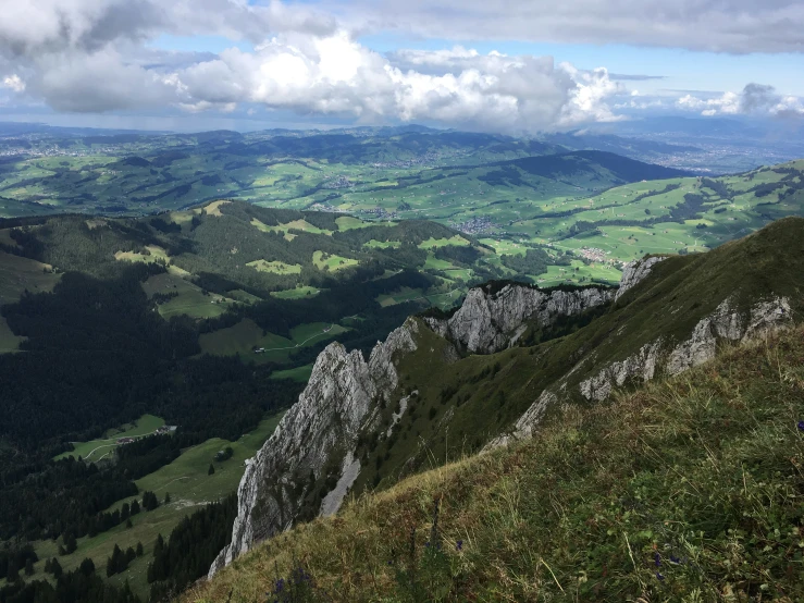 a view of mountains from a mountain top