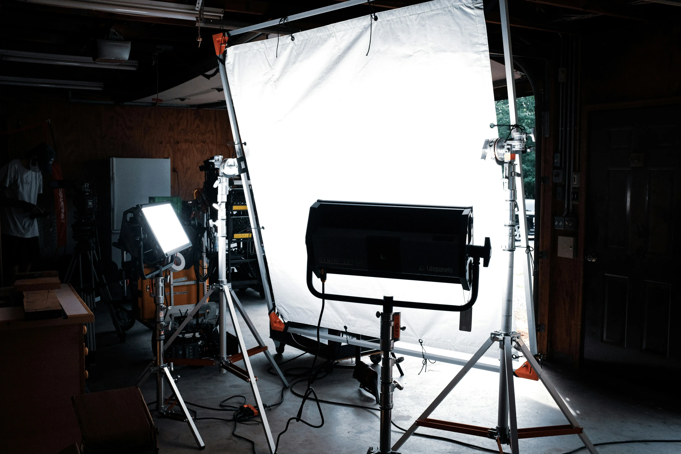 lighting equipment in dark space with one light lit up