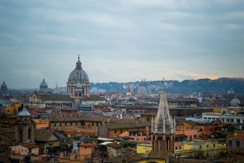 a city with an old building that has spires