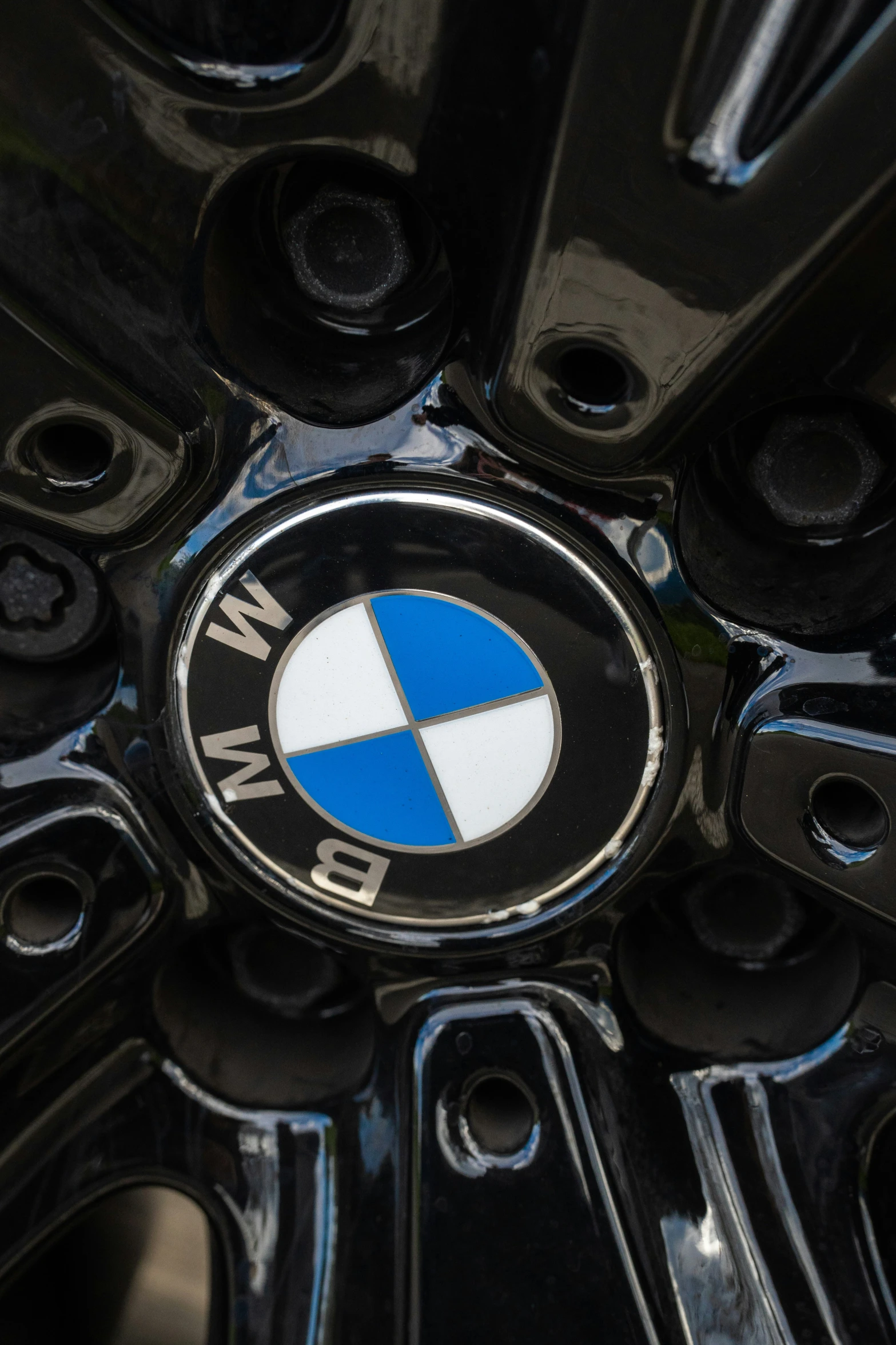 a wheel logo of a car made with black powder