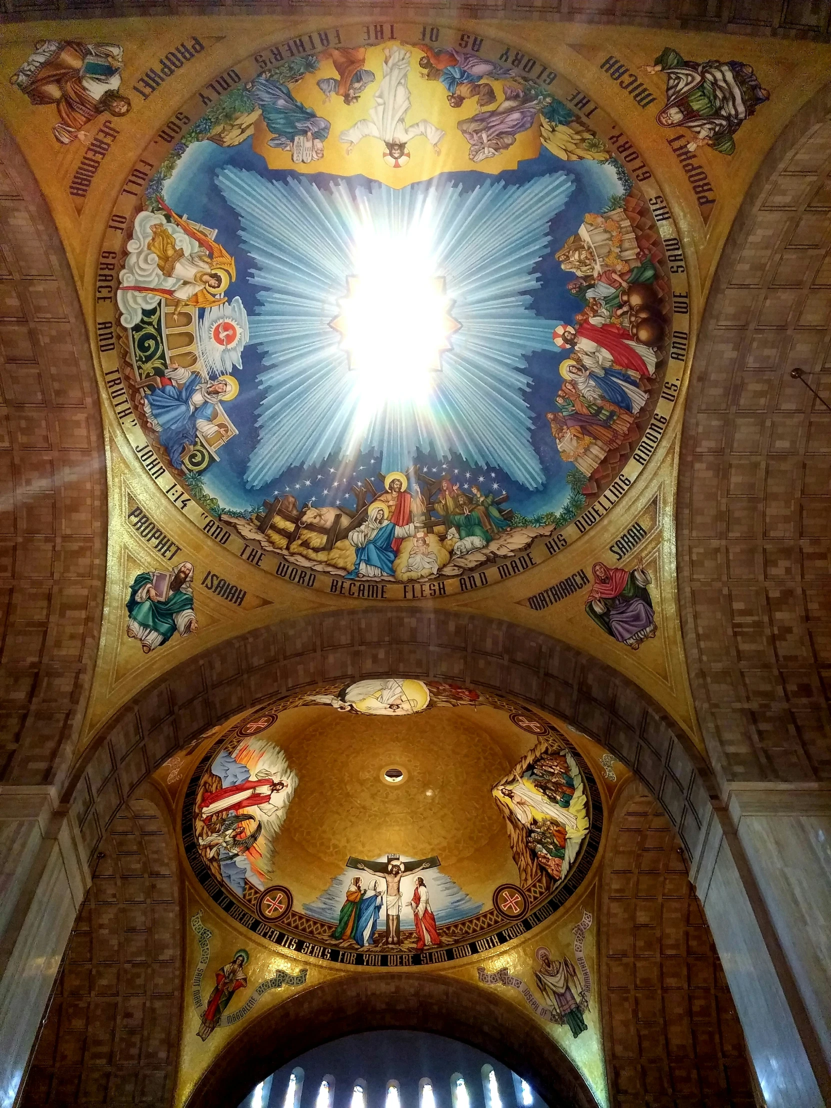 a close up view of a domed ceiling with paintings