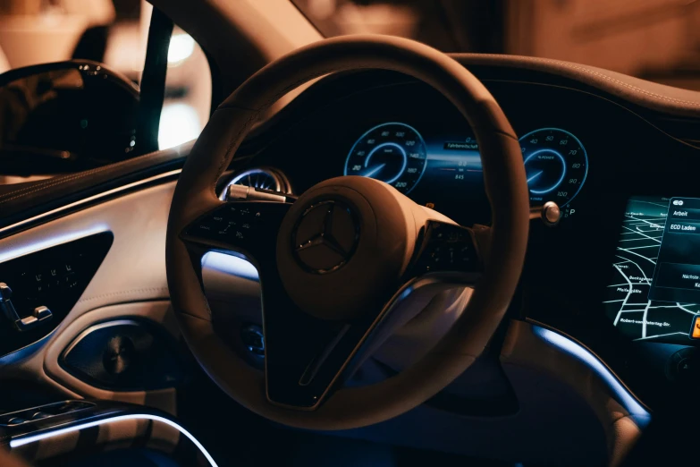 a car dashboard with a phone on the display