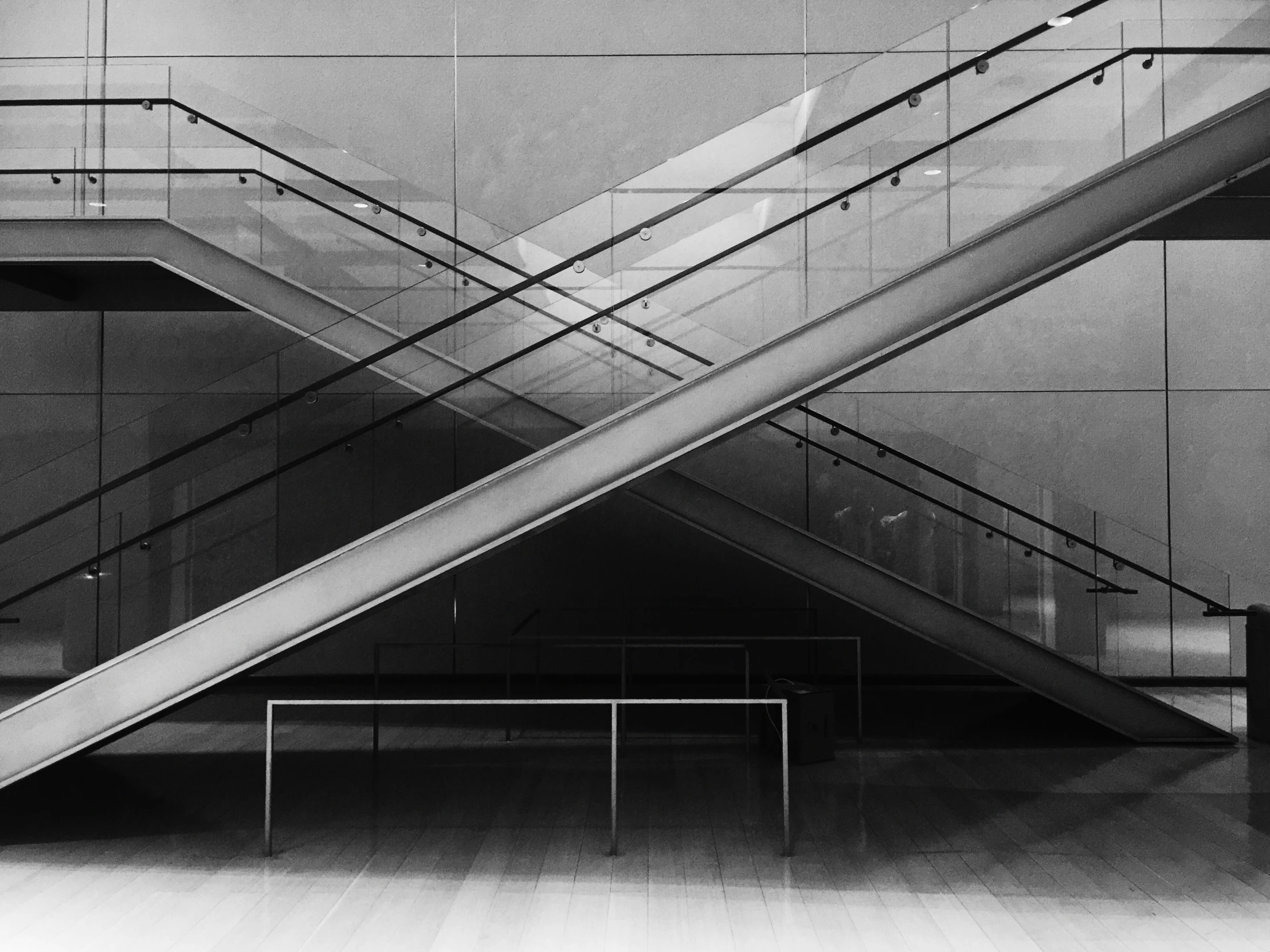 a staircase in a building with an escalator