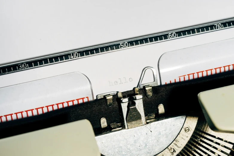 an old style typewriter with it's tape