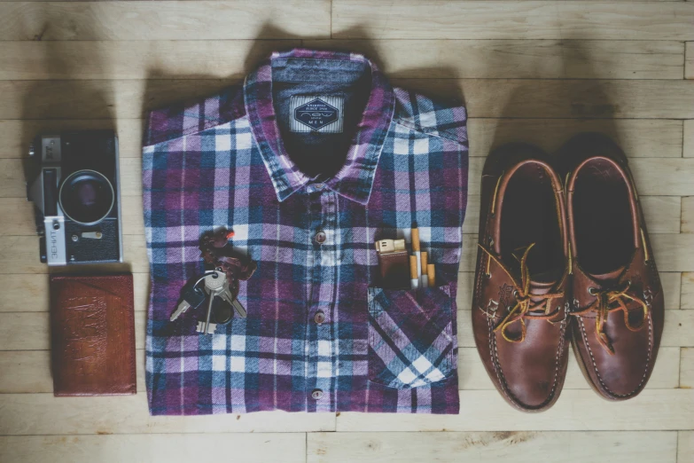 a shirt, wallet, and pair of shoes