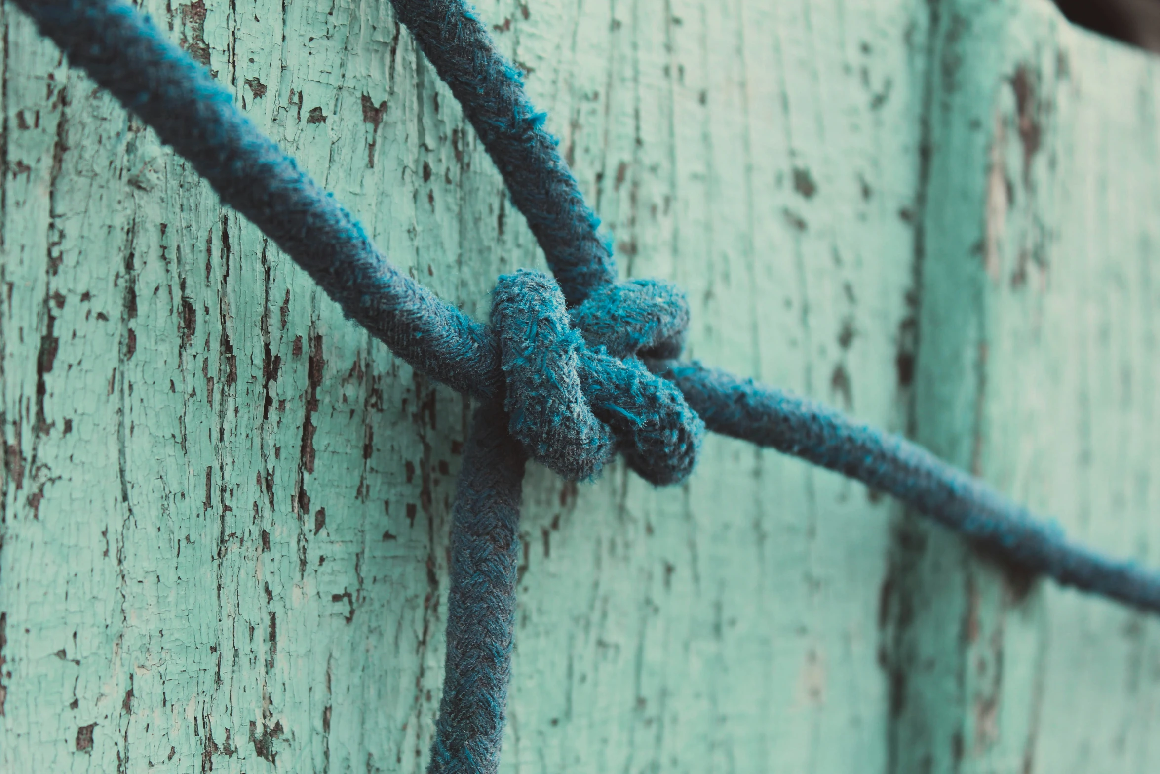 a close up view of a knoted up curtain