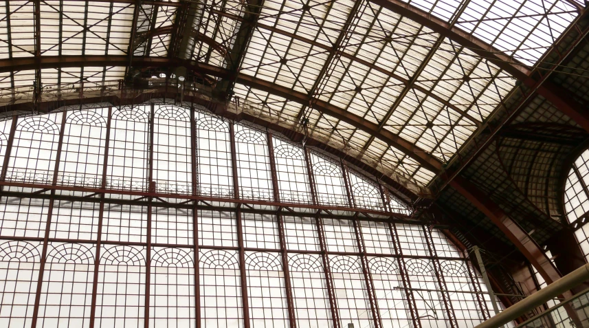 large metal windows on the ceiling of an indoor building