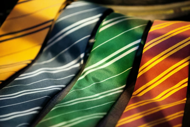 there are many ties in different designs and colors