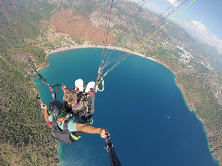 a man is parasailing with his feet on the side