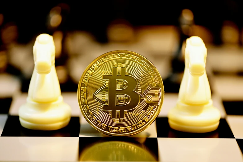 a coin sitting in front of chess pieces