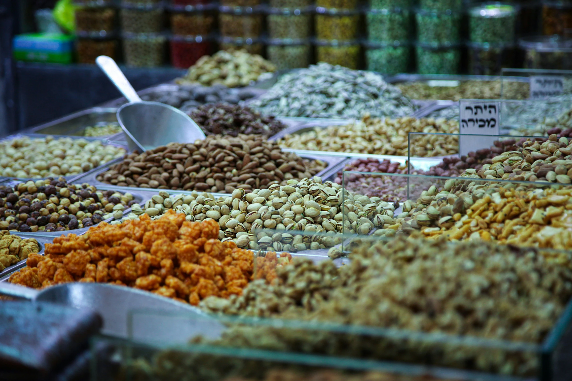 a variety of nuts and lentils in different sizes