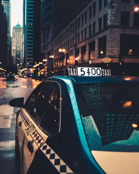 an image of a taxi cab on the road