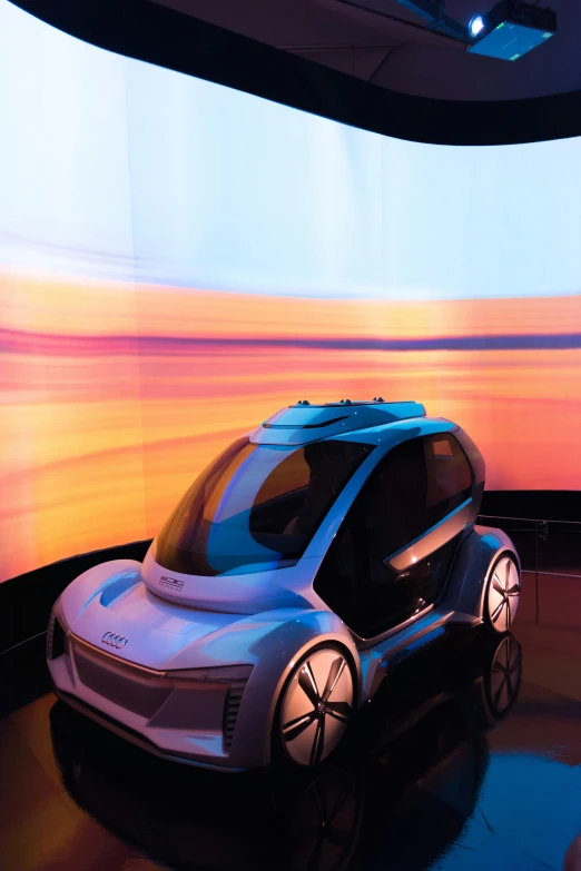 an image of a futuristic car on display