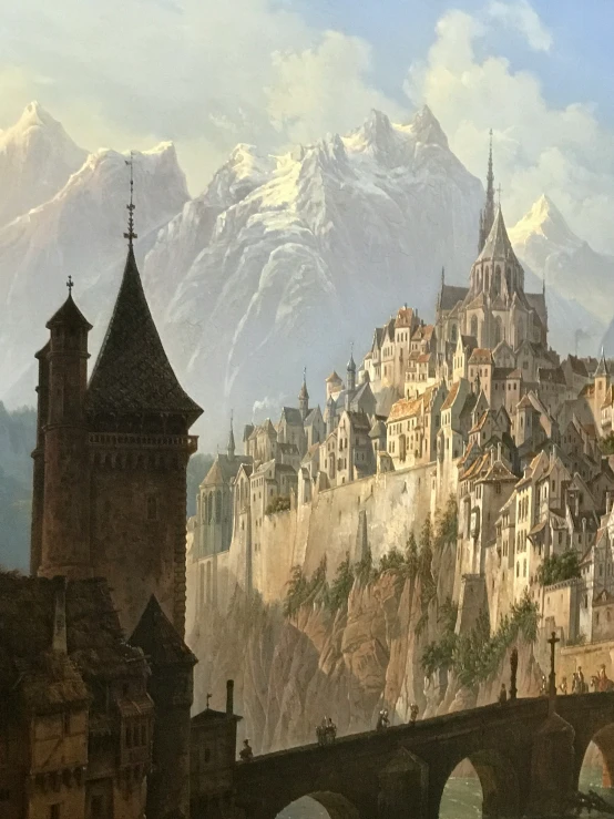 a castle with spires next to a mountain