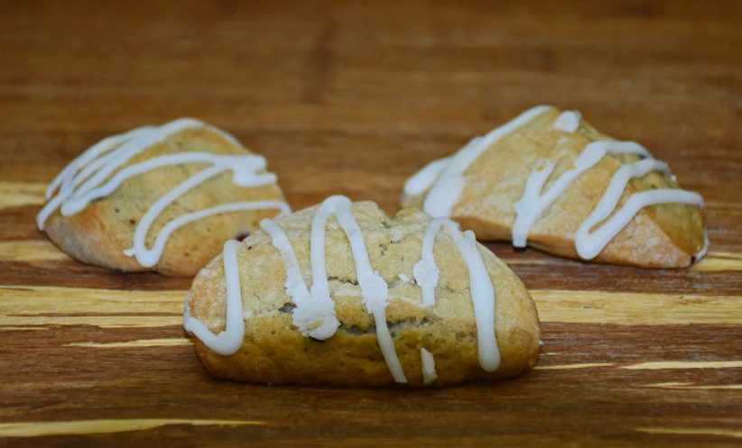 a loaf of chocolate chip cookies topped with white glaze