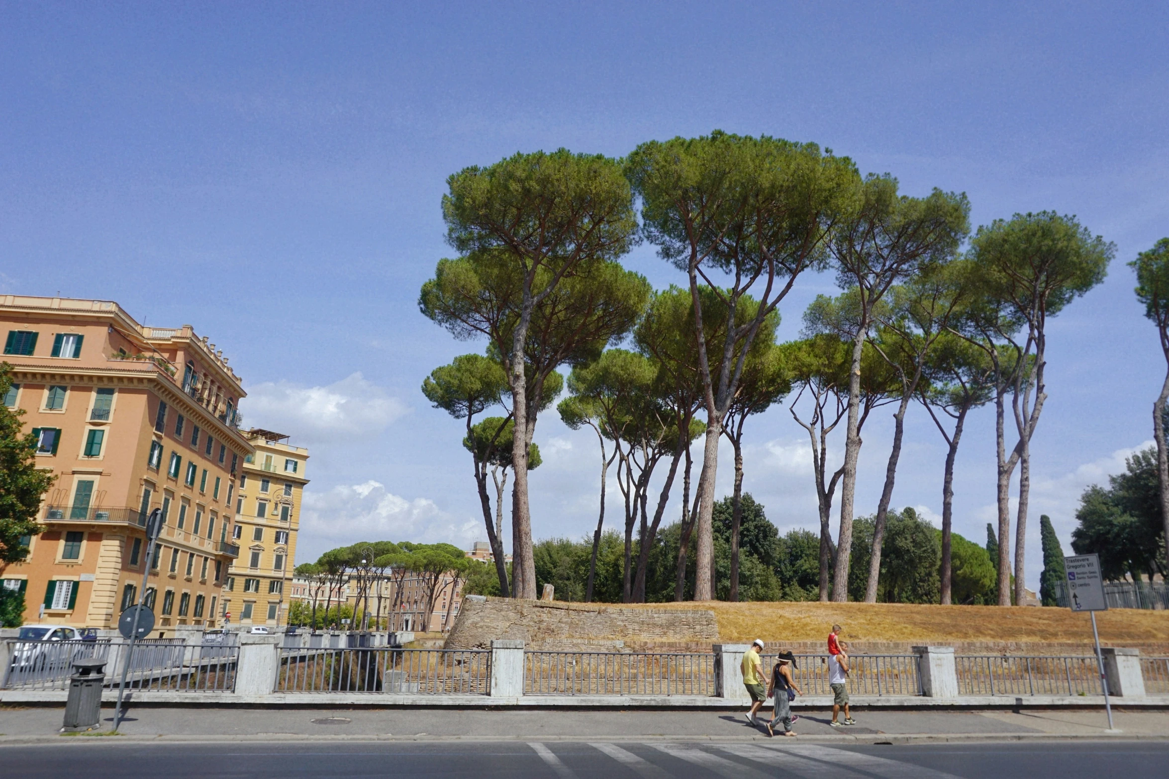 a couple of people on bicycles are crossing the street