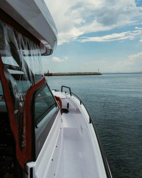 a boat traveling through the water at the ocean