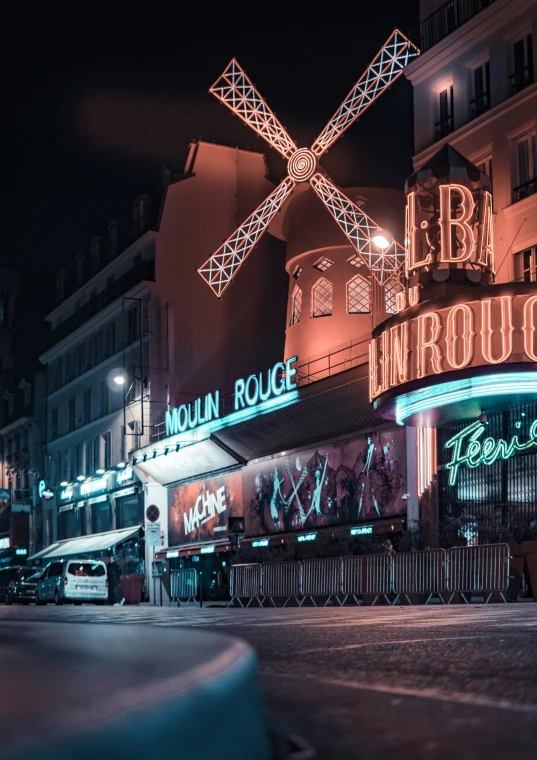 an illuminated sign on the side of a building