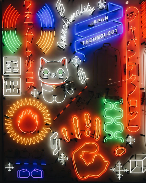 a group of neon signs and lights with a cat on one