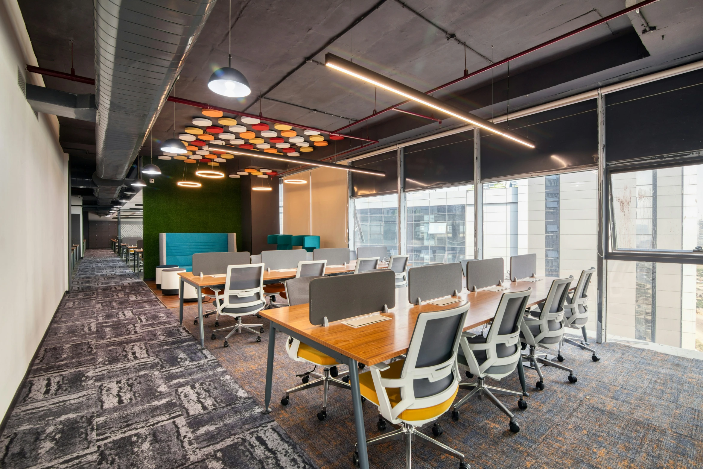 modern conference space with wood table and chairs