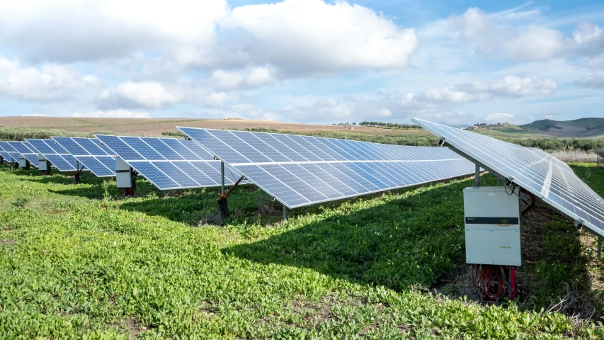 solar panels on a farm are being used as alternative generators