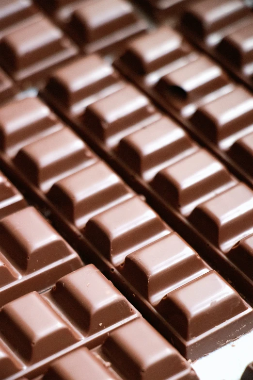 a counter top filled with lots of chocolate bar