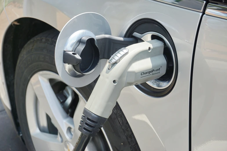 an electric car is charging up at a station