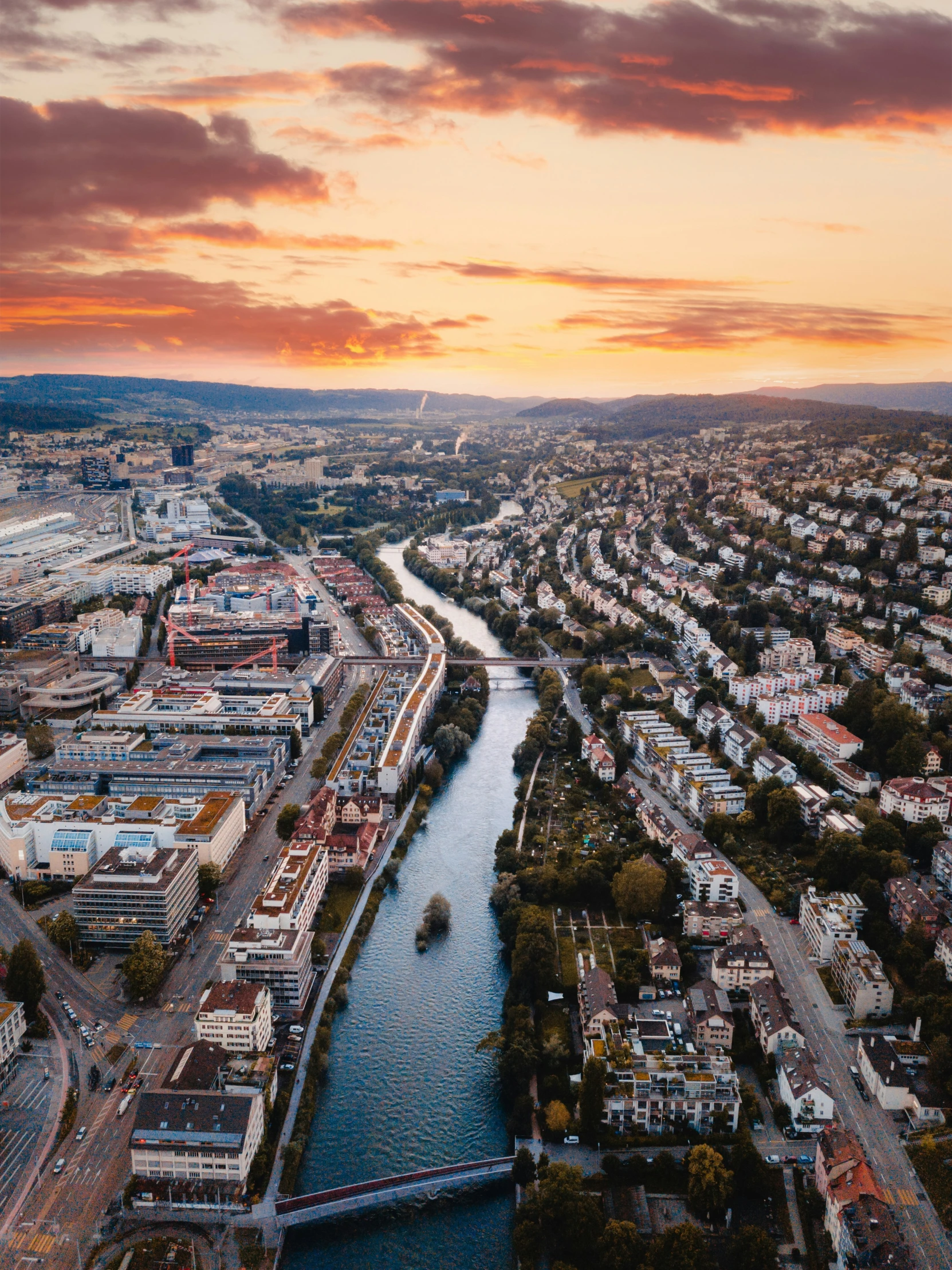 an aerial s of a town surrounded by water