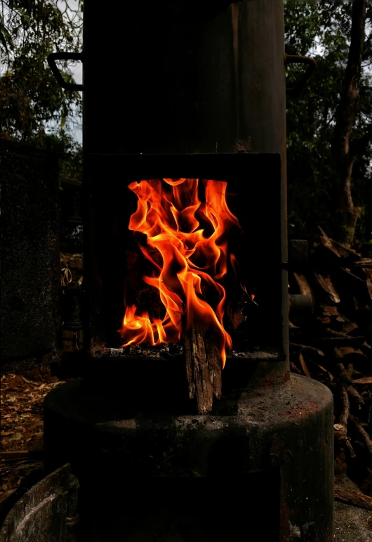 a large fire with lots of orange flames